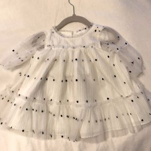 Beautiful white tulle white dress with polka dots.